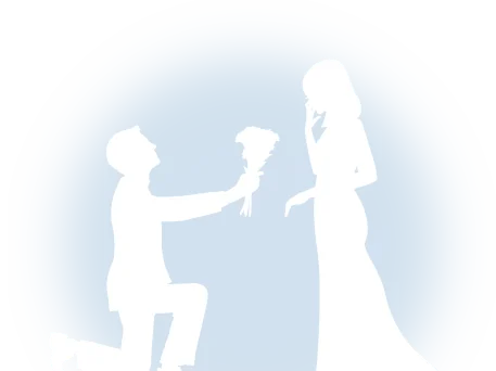 ひざまずいてプロポーズする男性と女性のシルエット